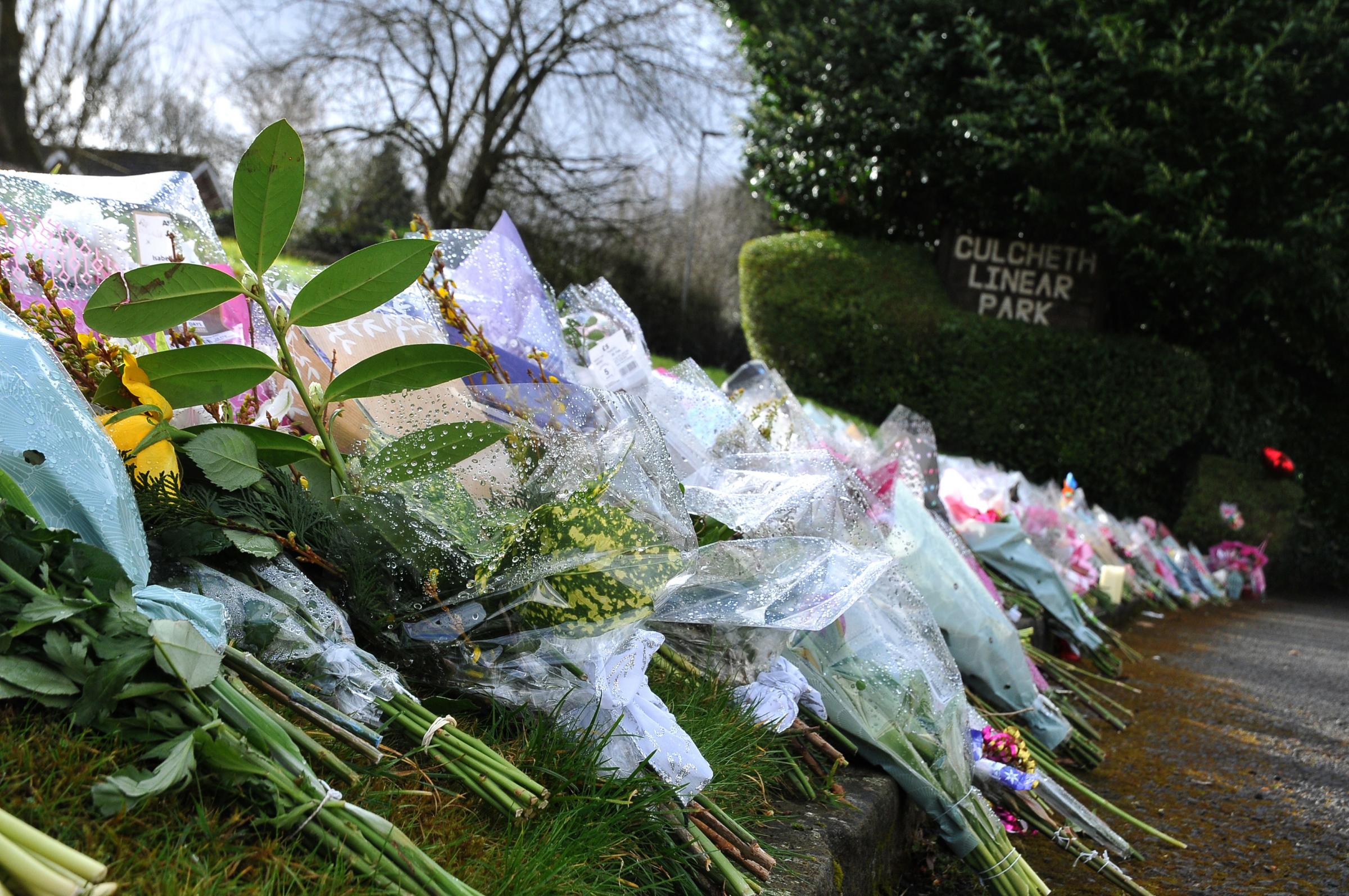 Floral tributes were left at the scene at Culcheth Linear Park following the murder