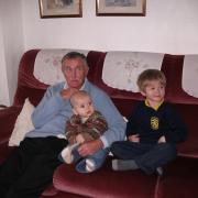 FAMILY: Brian loved spending time with his grandchildren. Pictured here in 2010 with two of them – Ted and Bill.