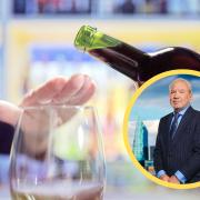 Background - A person declining wine, Foreground - Lord Sugar (PA)