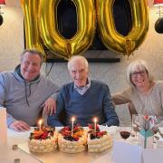 Bert enjoying his 100th birthday with his son Robin and daughter Brenda