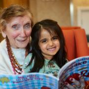 Resident Pauline Quinn sharing a bedtime story