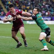 SCORER: Sale's Tom Curry is tackled by Northampton's Rory Hutchinson
