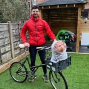 Ben Griffiths, 32, is set to complete the whole 117 miles on this 50-year-old Raleigh bike with his alien companion riding in the front