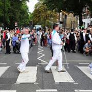 Paralympic torchbearers recreate the famous Beatles album cover at Abbey Road