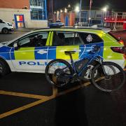 An illegal e-bike was seized in Farnworth town centre.