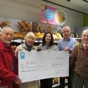 The Larkhill Centre Community Association, Michael Rose and Zoe Woodhead, CEO Food at the Co-op, Jo Whitfield, Co-op store manager, Rob McClement and Rod Woodhead from The Larkhill Centre Community Association at the Co-op on Stockport Road in Timperley