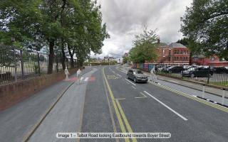 CGI mockup of Talbot Road with segregated cycle path and bus stop bypass