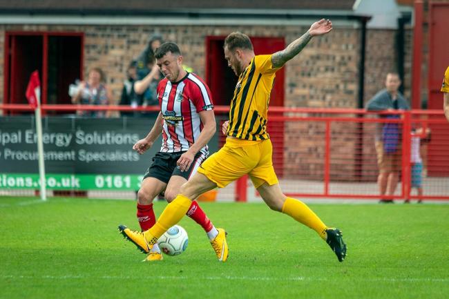 Jordan Hulme, in action against Boston recently, will sit out a ban for Altrincham. Picture by Michael Ripley Photography
