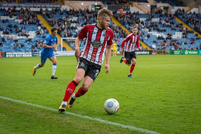 Altrincham's Andy White in action at Stockport. Picture by Michael Ripley Photography