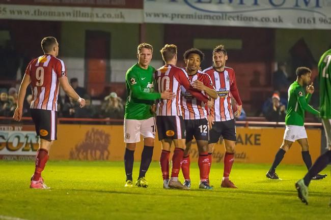 Alty substitute Kallum Mantack, centre, celebrates a goal on his debut. Picture by Michael Ripley Photography